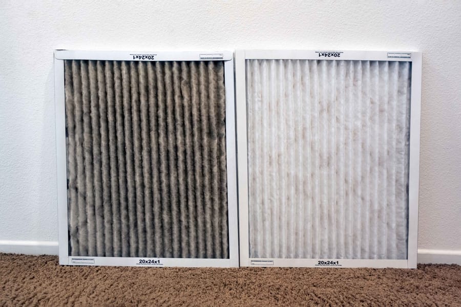 A side-by-side comparison of clean and dirty air conditioning filters